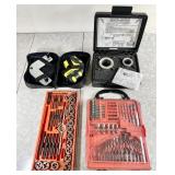 Assorted tools with drill bits, laser level, etc.