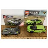 2 assembled Lego cars