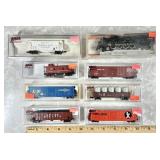 8 Atlas "N" Scale model train cars