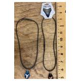 2 shark tooth necklaces