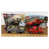 2 assembled Lego cars