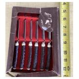 Set of stainless stag handle steak knives