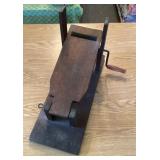 Primitive hand crank turnip shredder