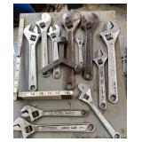 Adjustable wrenches