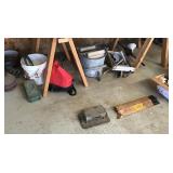Assorted tools & primitives under table