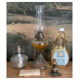 3 assorted oil lamps and oil