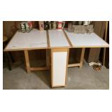 Folding craft table on casters