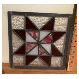 Framed stained glass panel