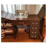 Sewing machine and cabinet