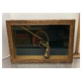 Old West shadowbox with gun and horseshoe