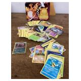Pokï¿½mon cards and lunchbox