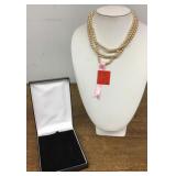 3-strand Mallorca pearl necklace.