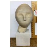 Decorative wood and concrete sculpture