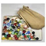 Vintage glass marbles in suede drawstring pouch