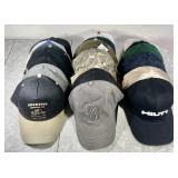 21 assorted advertising and team caps