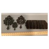 3 cast-iron trivets and cornbread pan