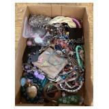 Flat of costume jewelry