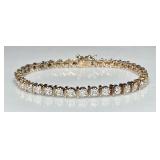 Gold over sterling tennis bracelet -clear stones