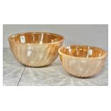Pair of Fire-King peach lustre Swirl mixing bowls