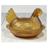 Amber glass hen on a nest dish
