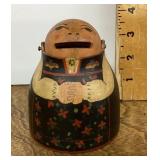 Wooden folk art coin bank with rotating head