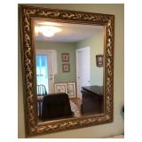 Large gold framed mirror
