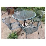 Metal mesh patio table, 4 chairs, and umbrella