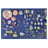 Pins, brooches, pendants, charms, chains, rings