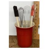 Red utensil crock with utensils