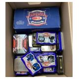 Box of empty baseball tins