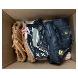 Box of baseball gloves and balls