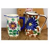 2 hand painted pottery pitchers