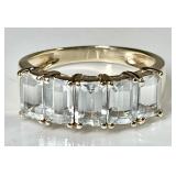 14k gold ring with 5 light blue stones