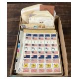 Box of US commemorative stamps