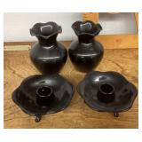 Black glass candleholders and vases