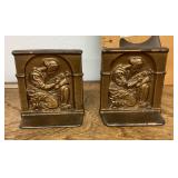 Pair of cast iron "The Student" book ends