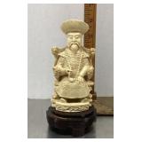 Carved resin Chinese emperor statue on wood base