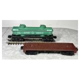 O-scale Lionel tank car and flat car w/track