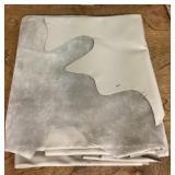 2 pieces of tan upholstery leather