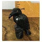 Carved obsidian raven