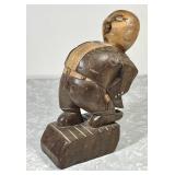Carved wood folk art fat man sculpture