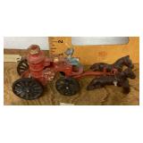 Cast-iron horse-drawn fire engine