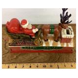 Cast-iron Happy Holidays coin bank