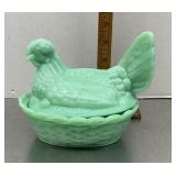Green milk glass hen on a nest