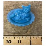 Mini blue glass cat on nest