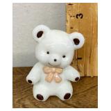 White glass bear with pink bow