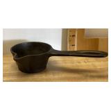Vintage cast iron Erie candle wax ladle