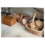 Baskets and breadbox under table