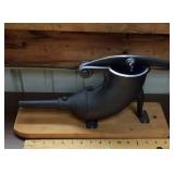 Antique cast iron sausage stuffer