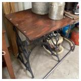 Table with cast iron sewing machine legs